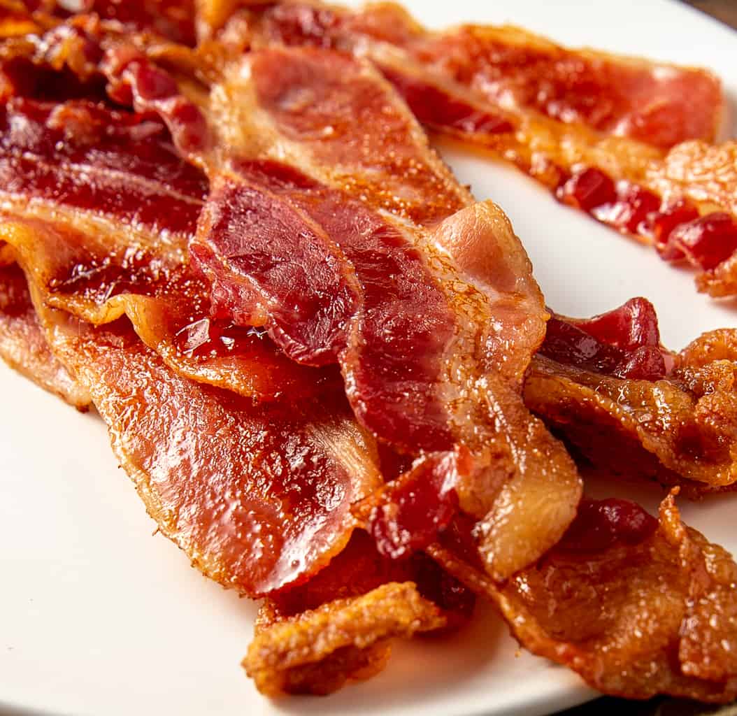 https://basilandbubbly.com/wp-content/uploads/2021/01/how-to-cook-bacon-in-the-oven-4.jpg